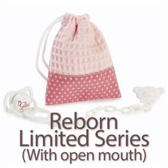 Pink star-patterned bag with ASI pacifier and bear-shaped clip for Reborn Limited Series dolls.