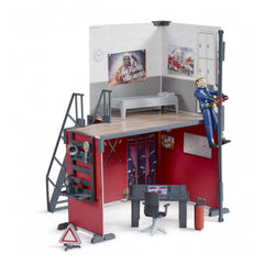 Bruder bworld Fire Station playset with firefighter figure sliding down a pole, control center, and firefighting gear.