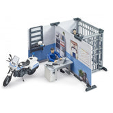 Police station playset with a desk, officer figure, police motorcycle, jail cell, and wall accessories for imaginative play.