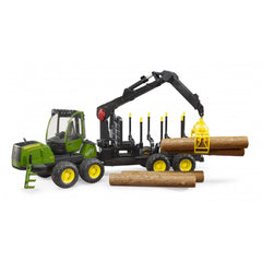 John Deere toy forwarder with crane loading tree trunks, green and yellow details.