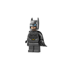 LEGO Batman minifigure wearing a black suit with blue eyes and a flowing cape, ready for action with a confident expression.