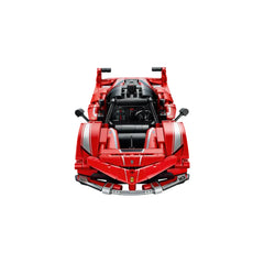 LEGO Ferrari FXX K model car kit displayed from above, showcasing its vibrant red color, detailed exterior, and features like the butterfly doors and intricate engine.