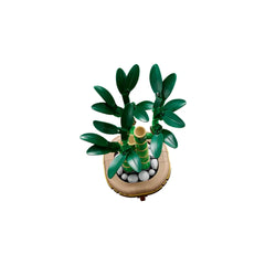 Lego Botanicals Lucky Bamboo construction set featuring three green bamboo stems with vibrant leaves, set in a decorative pot with pebbles.
