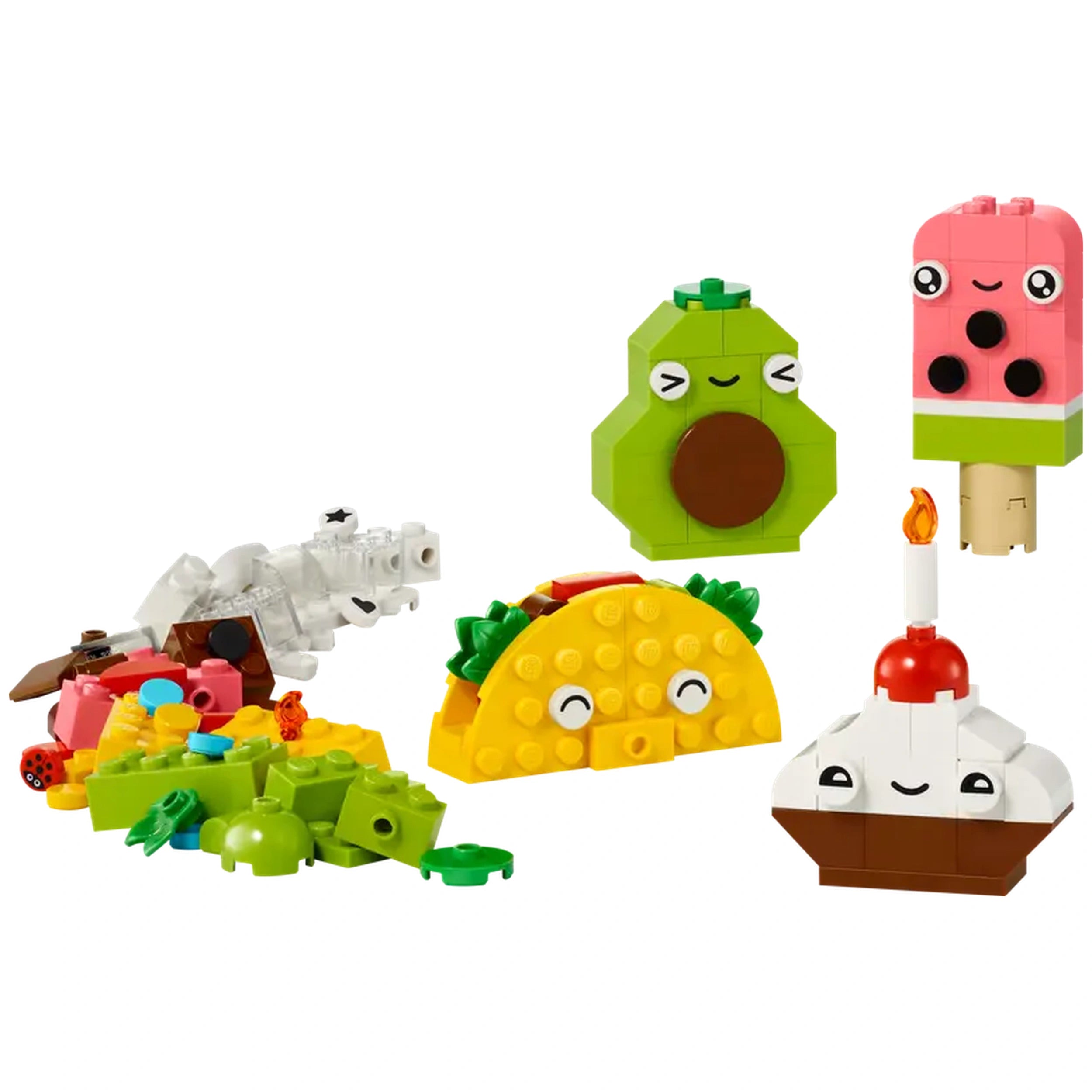 Colorful LEGO building bricks arranged to create four playful food characters: a smiling taco, a cheerful avocado, a cupcake with a cherry on top, and a pink ice cream pop. Various additional bricks are scattered around in vibrant colors, promoting creative play and storytelling for young builders.