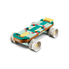 Colorful LEGO Creator Retro Roller Skate construction set featuring a vibrant skate design with pink wheels and decorative pieces.