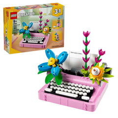 LEGO Creator 3in1 Typewriter with Flowers set featuring a pink typewriter, colorful brick-built flowers, and a brick sheet of paper.