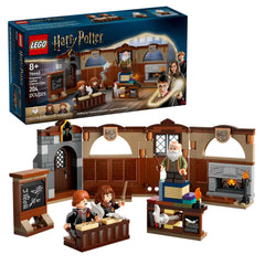 LEGO Harry Potter Hogwarts Castle Charms Class set featuring detailed classroom design with Ron, Hermione, and Professor Flitwick, desks, chalkboard, and magical elements.