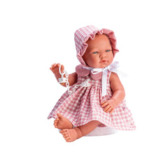 María doll in pink plaid dress, matching bonnet, and white bow. She has flexible limbs and a soft-touch vinyl finish.