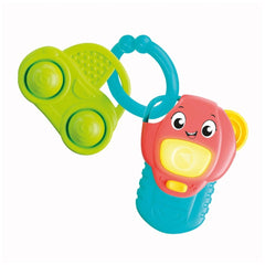Baby Clementoni toy car features a red body, yellow face, blue handle, and is designed for young children to hold and play.