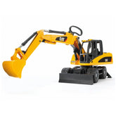 Yellow Bruder CAT wheel excavator toy with articulated boom, black wheels, and detailed cabin, designed for imaginative play.