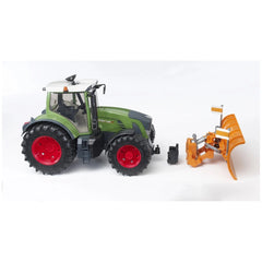 Green toy tractor with red wheels beside an orange plow blade for Mack, Scania, and MAN trucks on a white background.