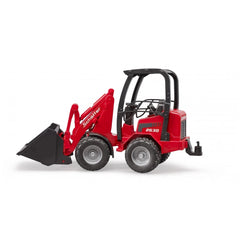 Red Bruder Schäffer Compact Loader 2630 with functioning bucket and kink steering, shown in side view.