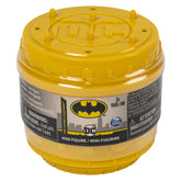 DC Comics BATMAN collectible blind box mini figure container features a yellow lid and black label with the Batman logo.