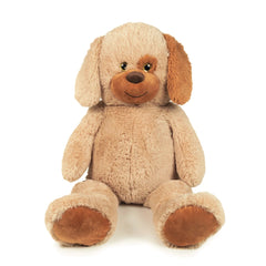 Maxi Sitting Dog Plush in light beige with shiny black eyes, brown nose, and soft plush material, featuring a round head and
