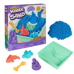 Kinetic Sand Sandbox Set features a green tray filled with bright blue sand and various flexible molds, all in a purple box.