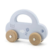 Little Car push and pull toy in white with blue roof, wooden wheels, kite design, and "label" text on the side.