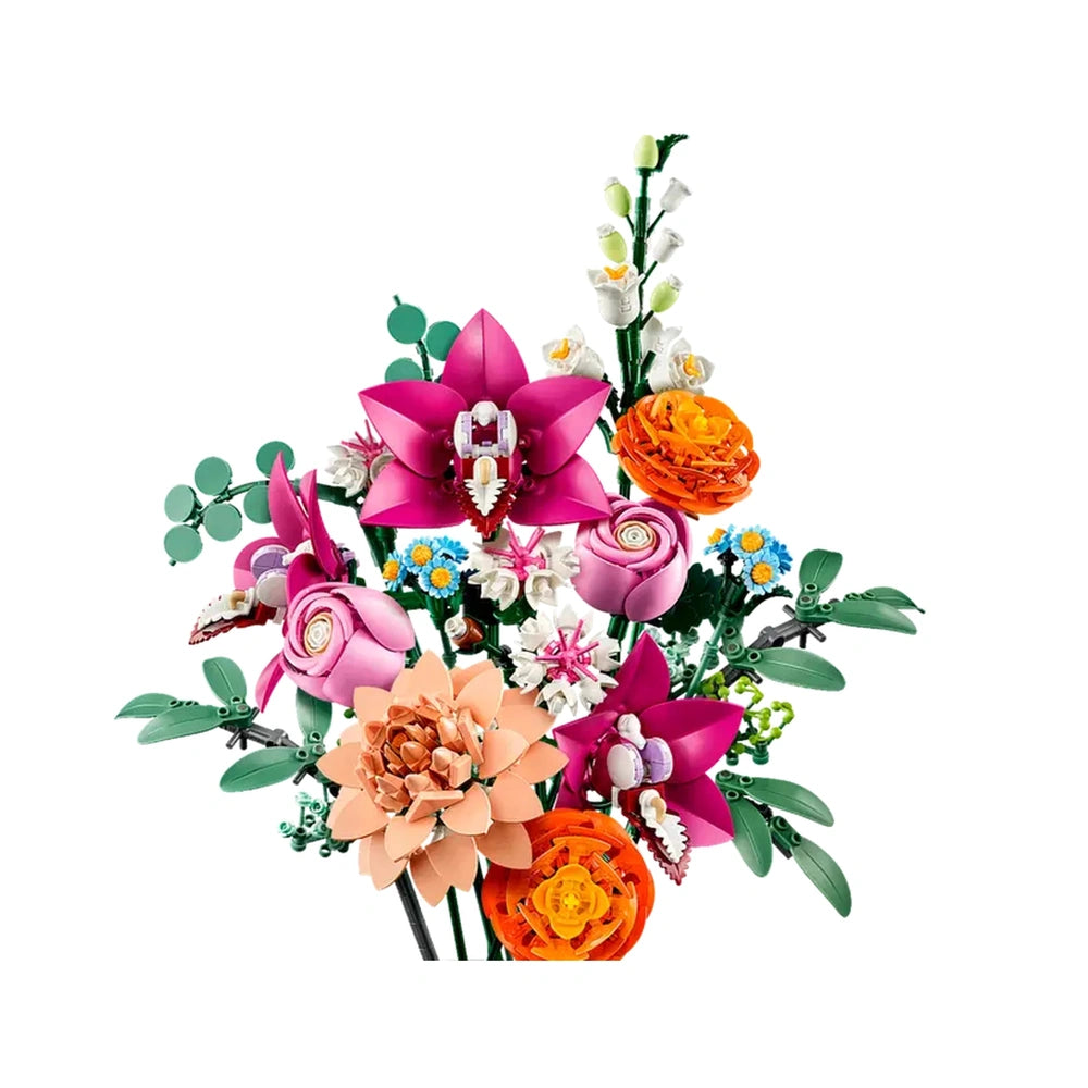 A vibrant LEGO® Botanicals bouquet featuring pink flowers, orange blooms, white blossoms, and lush green leaves, arranged artistically.