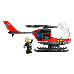 LEGO City Fire Rescue Helicopter in vibrant red, featuring spinnable rotors, water element launchers, and a firefighter pilot minifigure waving.