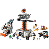 LEGO® City Space Base and Rocket Launchpad construction set featuring a detailed space station with a crane, rocket, and various mini-figures.