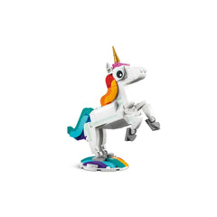 A vibrant LEGO unicorn rearing on a colorful base, featuring a golden horn, a rainbow mane, and playful, posable legs.
