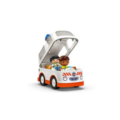 LEGO® DUPLO® ambulance toy with a paramedic and a girl inside, featuring a colorful design and an open roof for play.