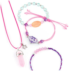 Positive Gems Jewelry features a pink string necklace with a clear crystal pendant and a colorful bead bracelet with metallic