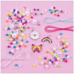 Rainbow Treasure Bracelets featuring colorful beads, metallic charms, and pink-blue ribbons on a light pink background.