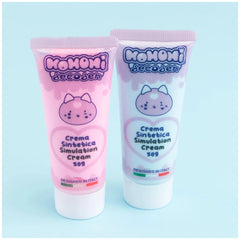 Momomi Decoden Kawaii Artist creamy mirror and brush set featuring glossy pink and white tubes with heart designs and text la