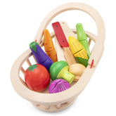 New Classic Toys vegetable basket with assorted plastic vegetables including corn, carrots, tomato, and cucumber in a red woo
