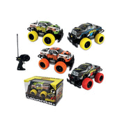ODS RC Pickup Monster Truck 4x4 in black with orange accents, glossy cardboard packaging, and yellow rubber wheels.