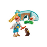 PLAYMOBIL Guinea Pig House toy set features a colorful orange and white house, figure, car, and multiple carrot accessories o