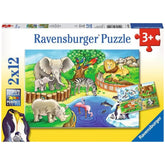 Ravensburger puzzle box featuring vibrant illustration of zoo animals like an elephant, zebra, rhino, and penguin in a natura