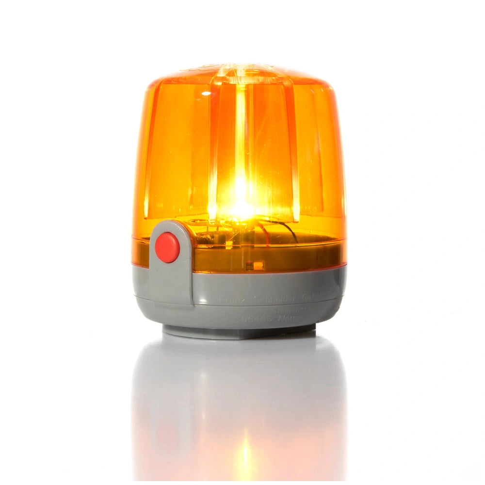 Rollyflashlight in orange features a cylindrical shape with a flared top, made of translucent material that glows warmly.