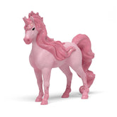 Cassiopeia Unicorn Mare figurine in glossy pink with a glittery mane and tail, standing against a plain white background.