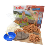 Teifoc construction toy set includes 155 pieces, a blue bowl, wooden spoon, and sand, all in earthy tones.