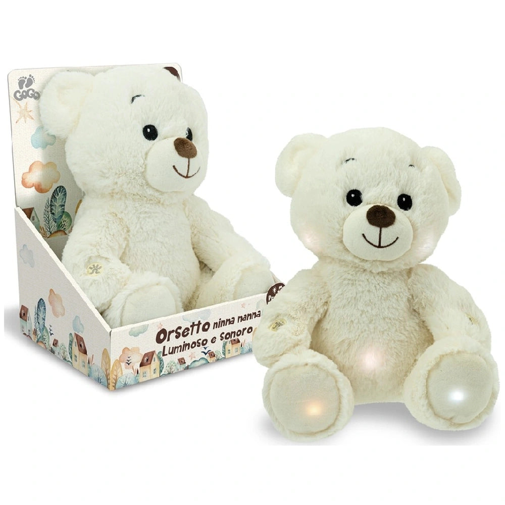 Teorema GoGo Luminous Sleep Aid Bear is a white plush teddy bear sitting upright in a colorful decorative box with a clear wi