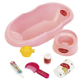 Theo Klein Baby Coralie pink bathtub set with accessories including a yellow spoon, pink comb, and pink-white bottle.