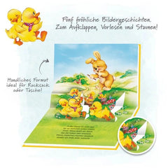 TROTSCH Easter Surprise Pop-Up Book features colorful cartoon ducks in clothing, set against a vibrant natural landscape.