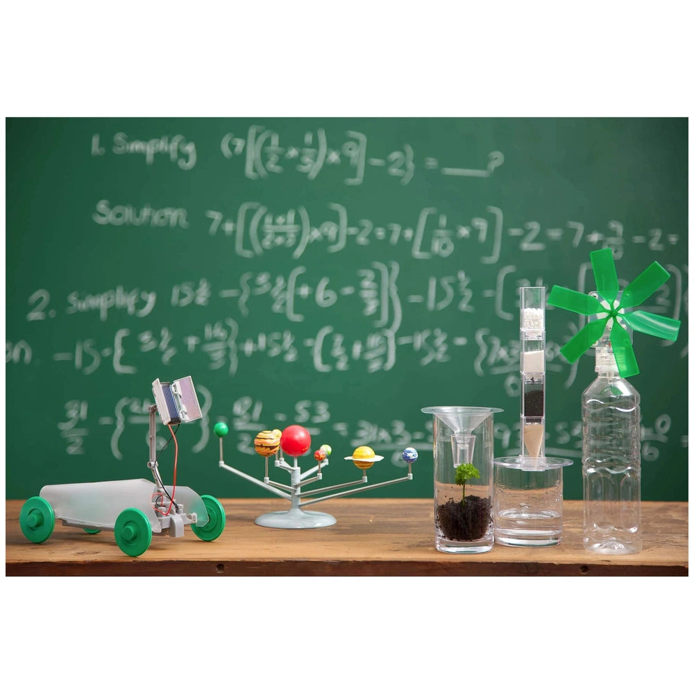 KidzLabs Planetarium educational toy featuring a green chalkboard and colorful toy train on a wooden table surface.