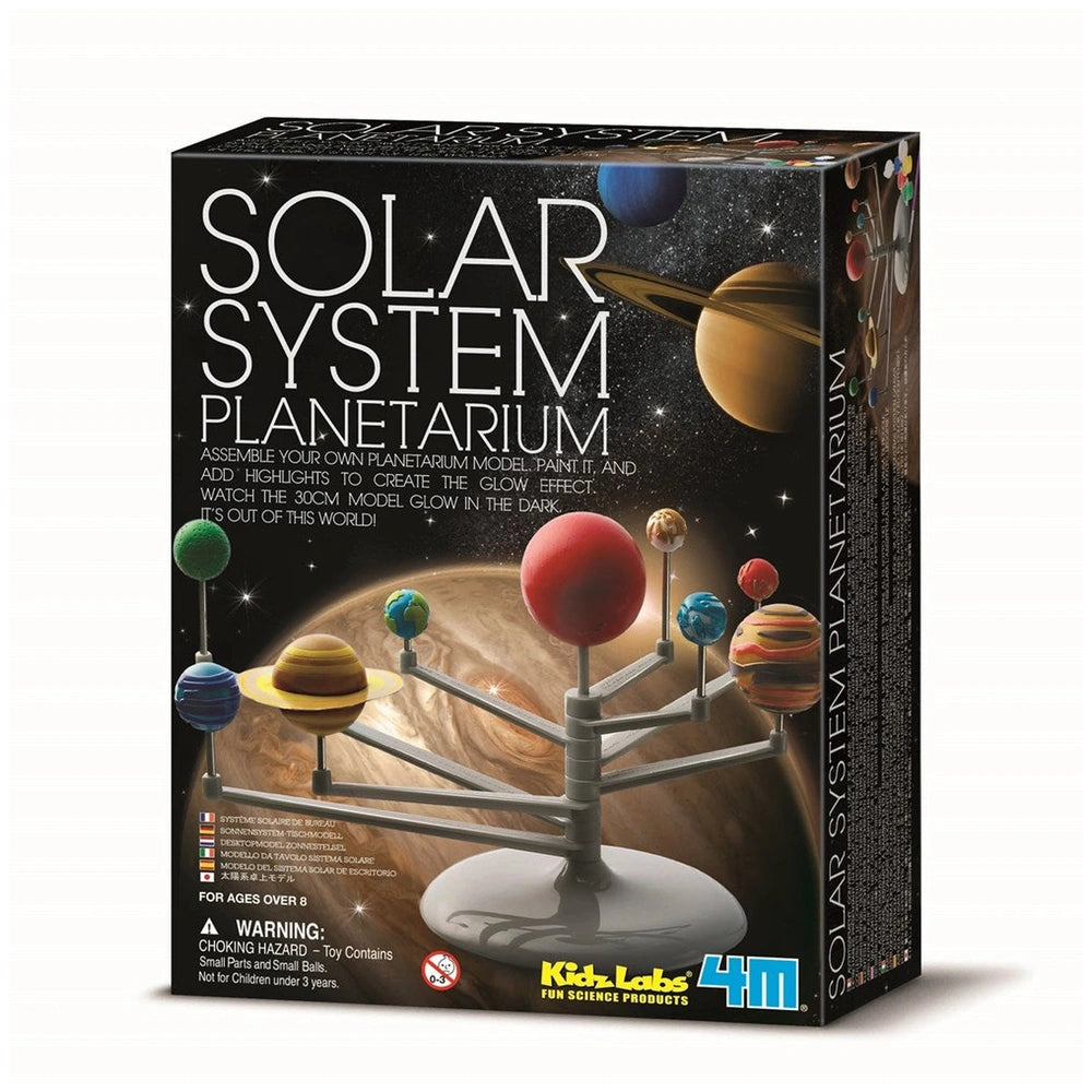 glossy cardboard packaging featuring a solar system model with colorful planets, a stand, and bright printed text on a black 