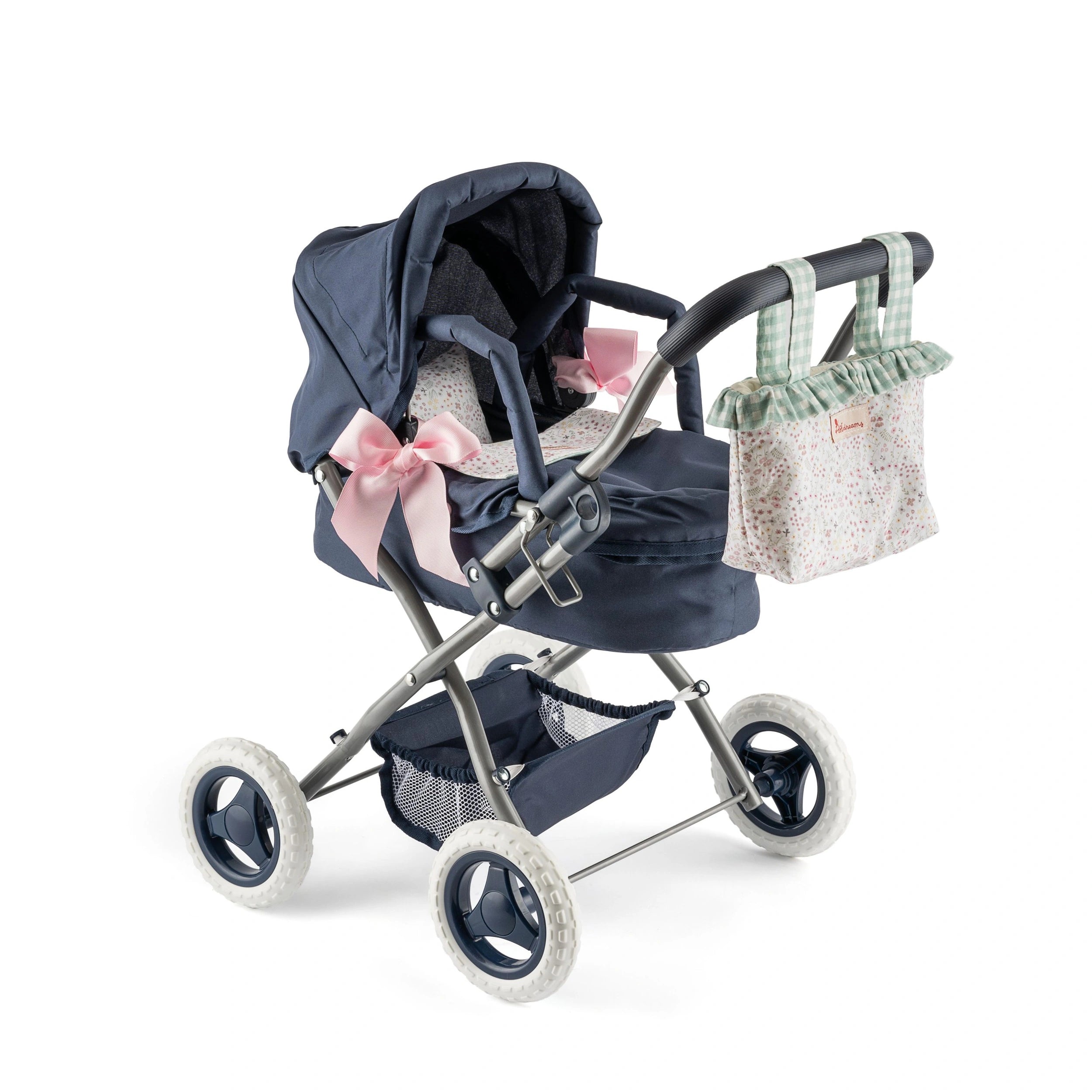 Navy blue toy stroller with pink bows, floral bedding, and a green checkered diaper bag attached to handle.