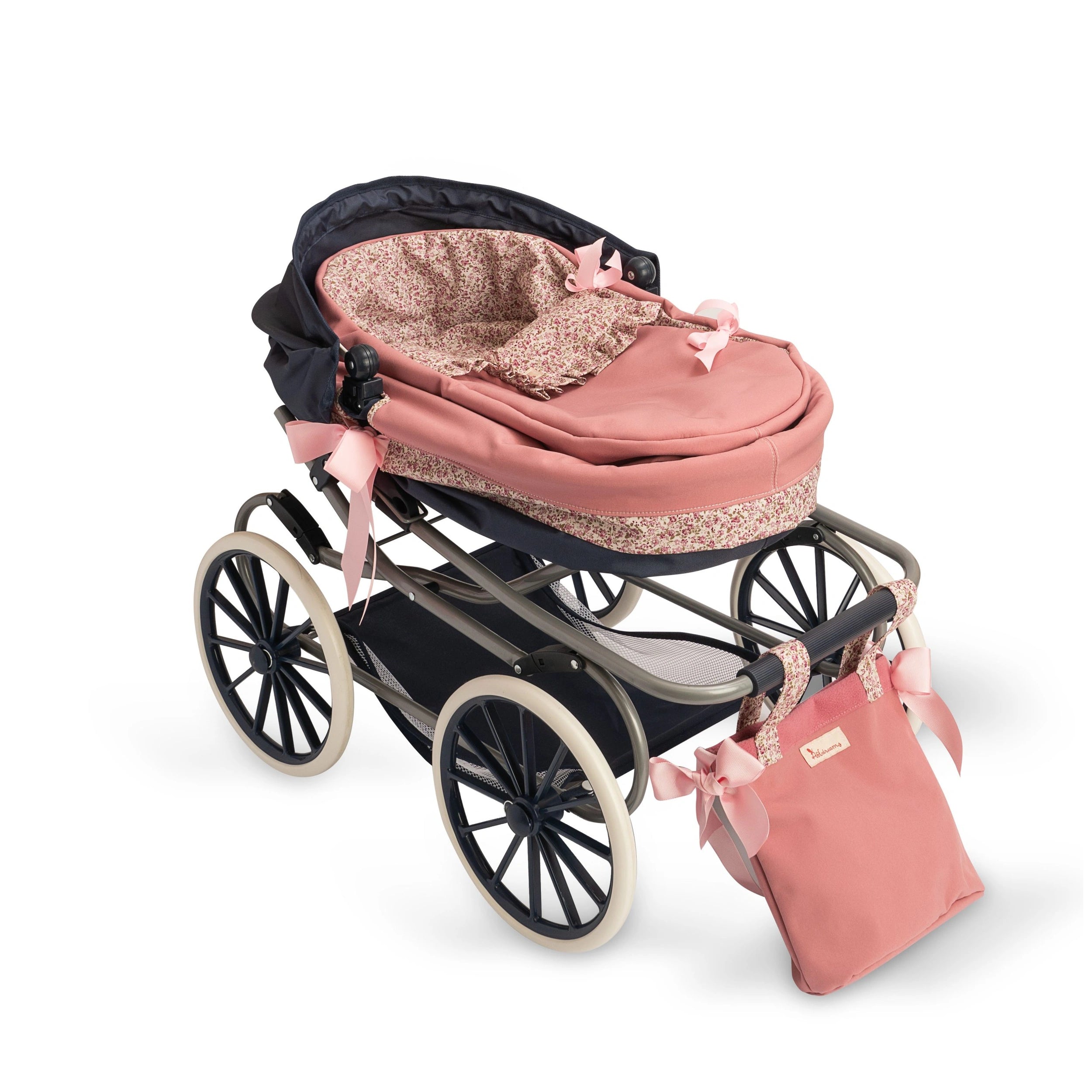 Pink and black ASI Doll stroller with floral patterns, large wheels, elegant hood, and attached matching bag.