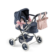 Dark blue toy stroller with pink bows, floral bag, and detachable canopy for dolls, from Asi Dolls Cloe Collection.