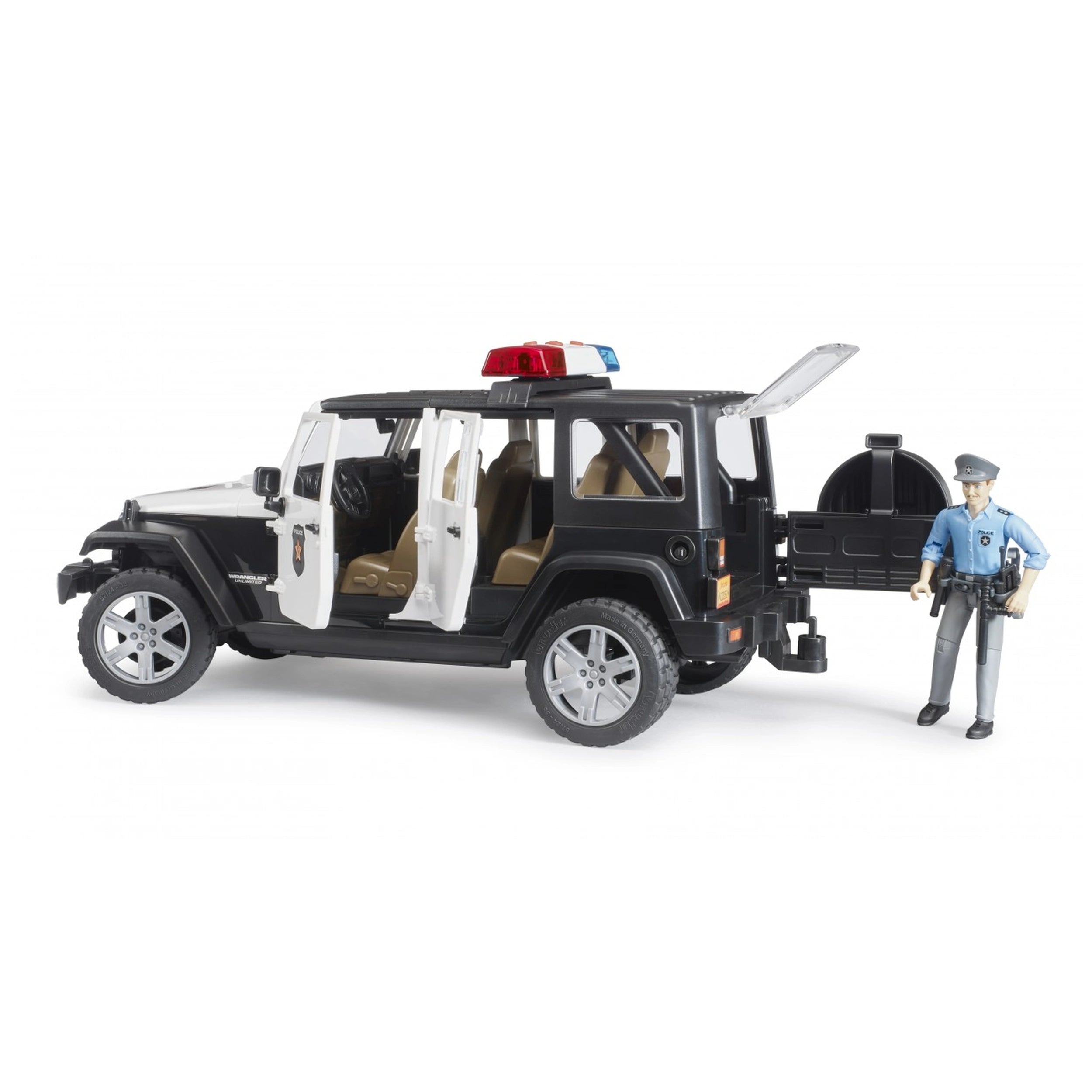 Black and white police Jeep toy with open doors, red and blue siren, and a policeman figure in uniform standing beside it.
