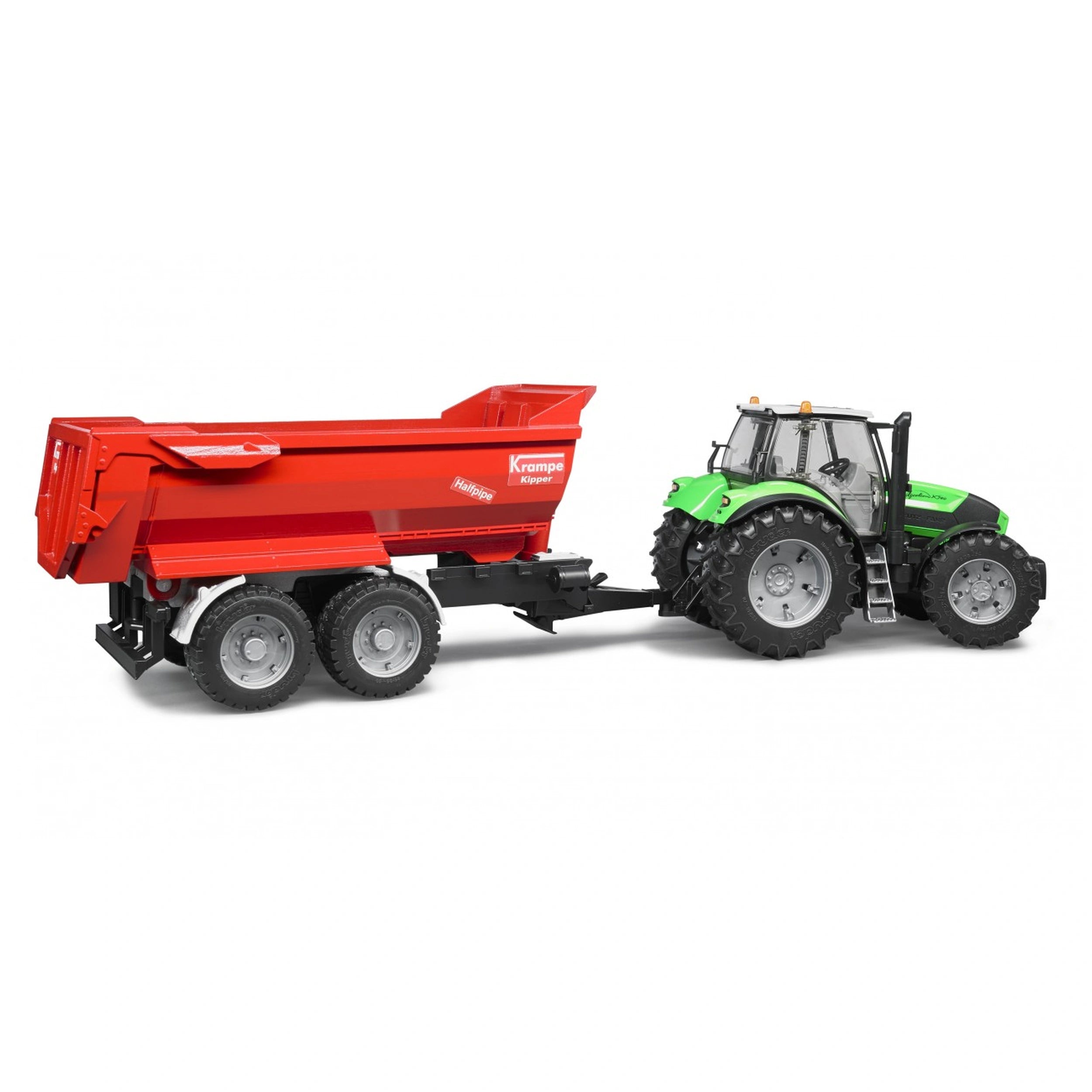 Green tractor with a red Krampe Tandem Halfpipe Tipping Trailer, showing robust wheels and realistic detailing.