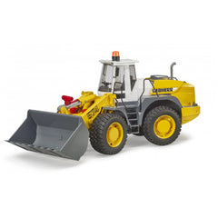 Yellow and gray Bruder toy front loader with rotating orange beacon on the roof, featuring detailed design and large tires.