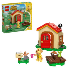 LEGO Animal Crossing Goldie's Cozy House set featuring a charming dog minifigure, a cozy house with a red door, picnic table, and detailed accessories.