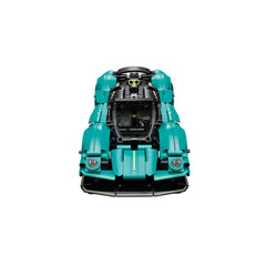 LEGO 42208 Aston Martin Valkyrie construction set in bright teal, showcasing intricate details, open gullwing doors, and visible V12 engine components.