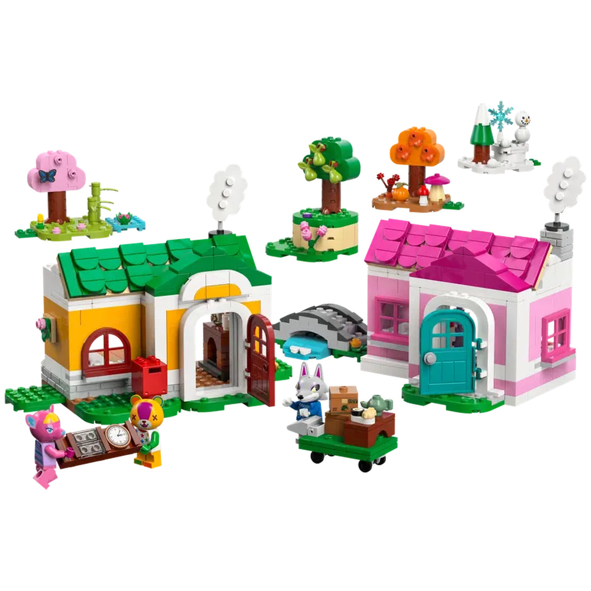 Colorful LEGO construction set featuring two charming houses, one yellow with green roof and one pink, surrounded by seasonal accessories like trees and small characters, perfect for imaginative play.