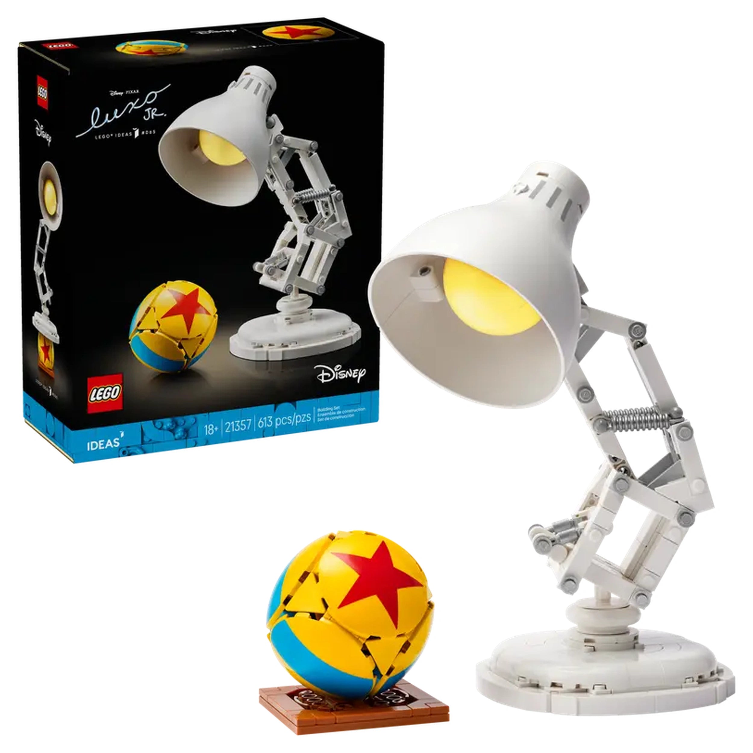 LEGO Disney Pixar Luxo Jr. model displaying a white articulated lamp beside a colorful star-patterned ball on a brown base.